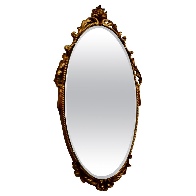 Long Oval Art Deco Atsonea Ornate Gilt Wall Mirror For Sale at 1stDibs
