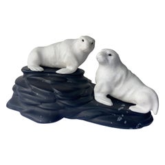 Vintage Eberhard Bank Carving, Sculpture of Two Dolomite Seals, on Black Obsidian Base