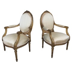 Pair of Louis XVI Style Gilded Arm Chairs