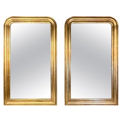 Paire de miroirs français Louis Philippe en bois doré à motif de lignes