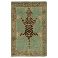 Rug & Kilim’s Distressed Tiger Skin Style Rug in Green, Beige & Black Pictorial