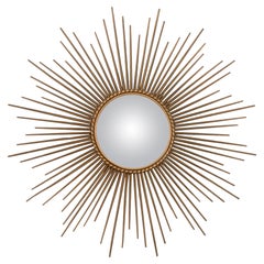 Miroir en métal Sunburst de Vallauris de style château français du XXe siècle 