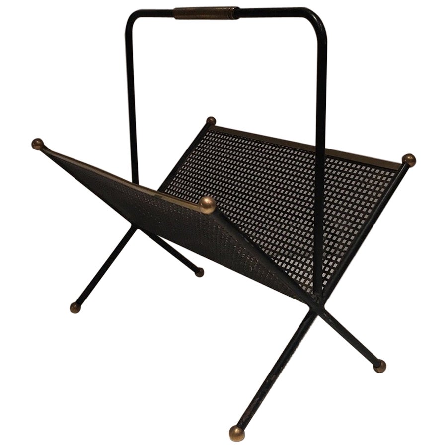 Italian Mid Century magazine rack made of brass and perforated sheet