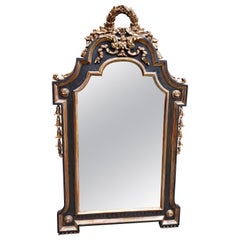 Retro Louis XVI Style Ebonized and Gilt Gesso Decorated Mirror
