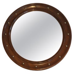 Mirroir rond en bois et laiton, oeuvre française, vers 1950