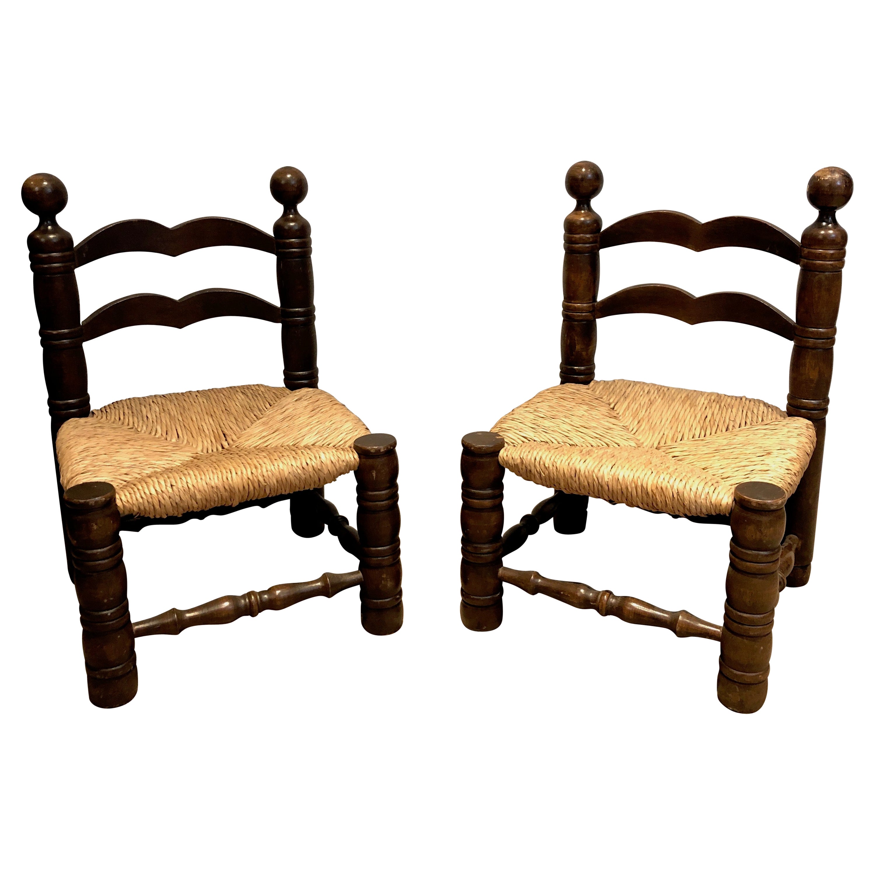 Pair of Low Brutalist Chairs. French work by Charles Dudouyt. Circa 1920.