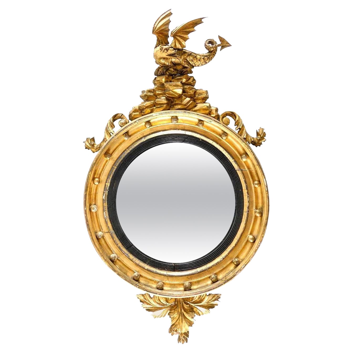 Miroir convexe en bois doré sculpté du XIXe siècle en vente
