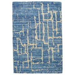 Alfombra contemporánea de lana azul abstracta hecha a mano