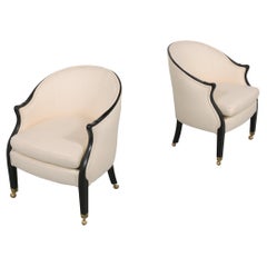 Pair of Lounge Chairs by Baker