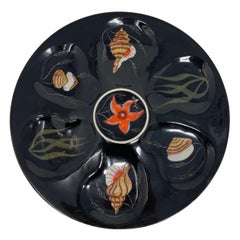 Assiette à huîtres en porcelaine de faïence signée Henriot Quimper, vers 1940