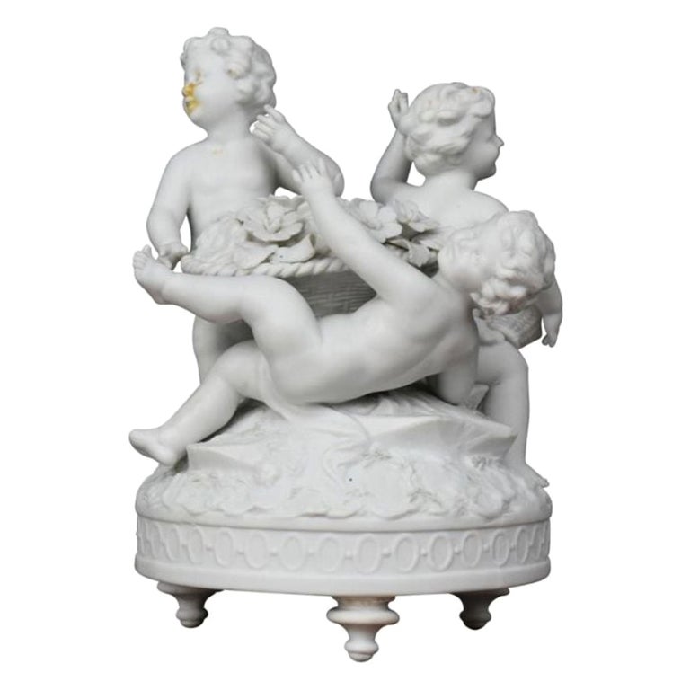 Group of Three Cherubs Around a Biscuit Basket, 1900 Period For Sale at  1stDibs