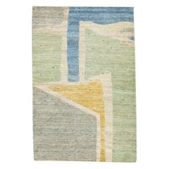 Tapis en laine moderne abstrait et multicolore fait à la main