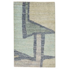 Tappeto moderno fatto a mano in lana personalizzato verde e beige astratto