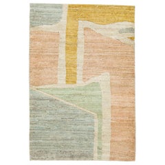 Tapis en laine moderne abstrait et multicolore fait à la main