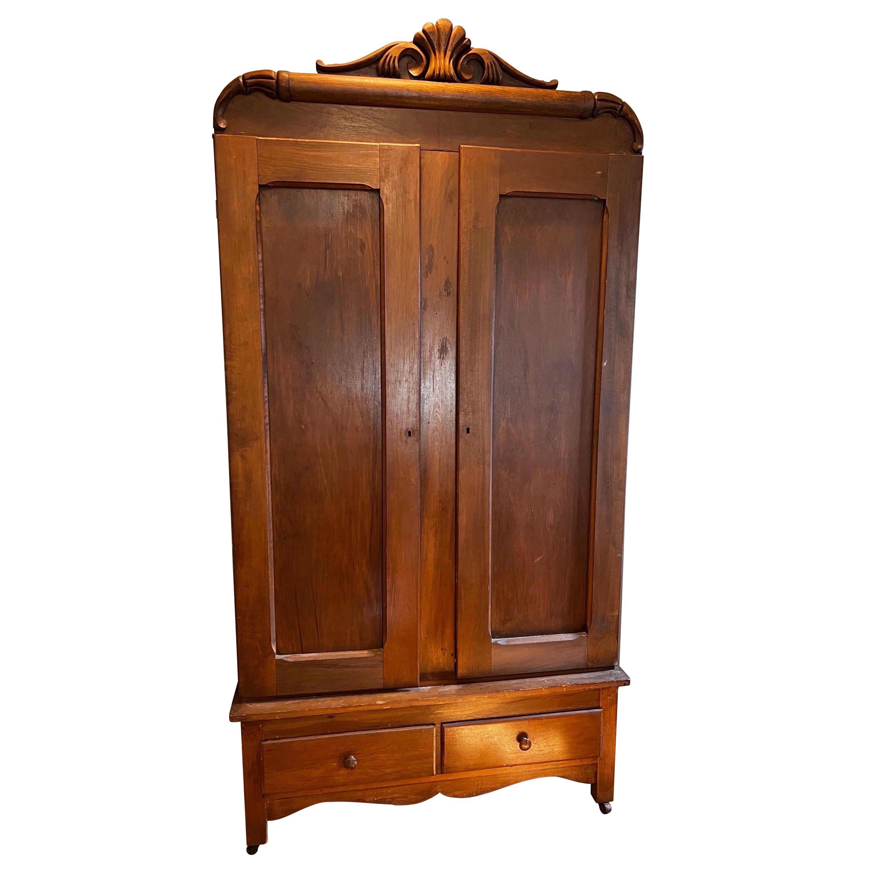 Antique Cabinet /Armoire with Carved Detail on Top For Sale
