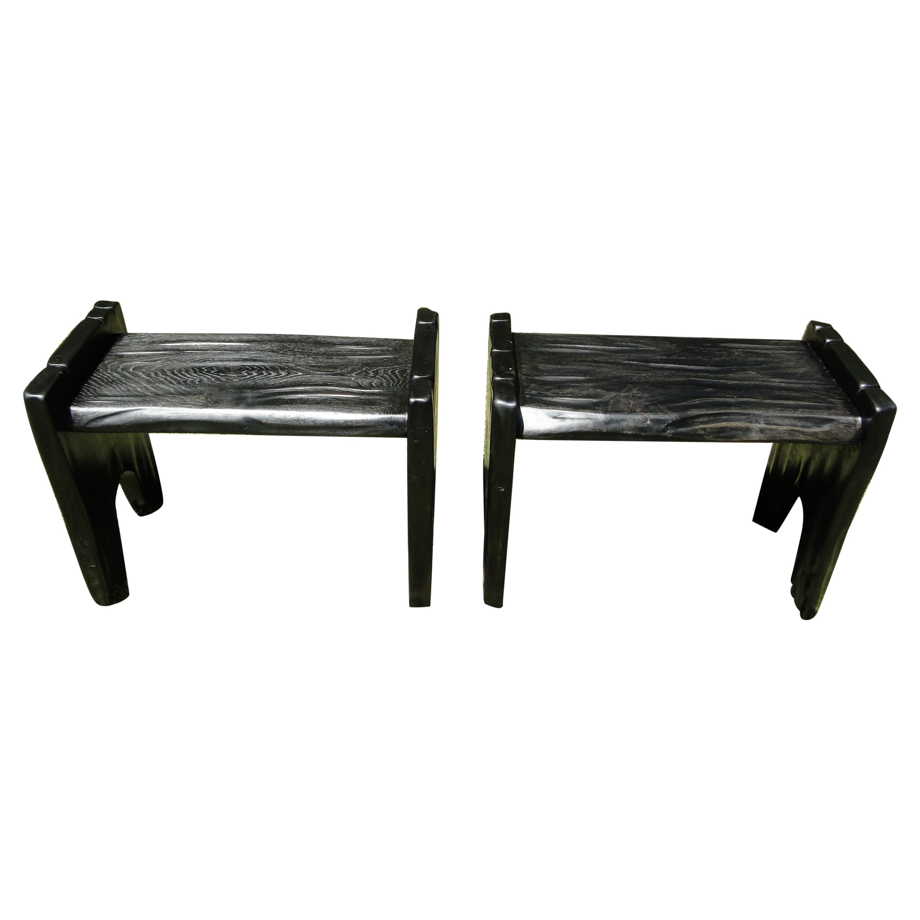 Set of 2 sculptural stools joined and carved by hand vintage black oak unique pieces France.
French work, the stools are hand-carved, the curves are soft and the veins of the wood are magnificent.
They can be presented at the end of the sofa,