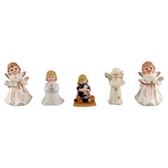 Cinco figuras de porcelana, ángeles y niños, años 80