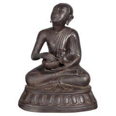 Bronze Lost Wax Sculpture Depicting a Praying Buddhist Monk with Offering Bowl