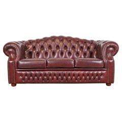 Vintage English Tufted Oxblood Leather Camelback Chesterfield Sofa