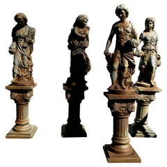 A Set of Old Weathered Classical Statues of the 4 Seasons