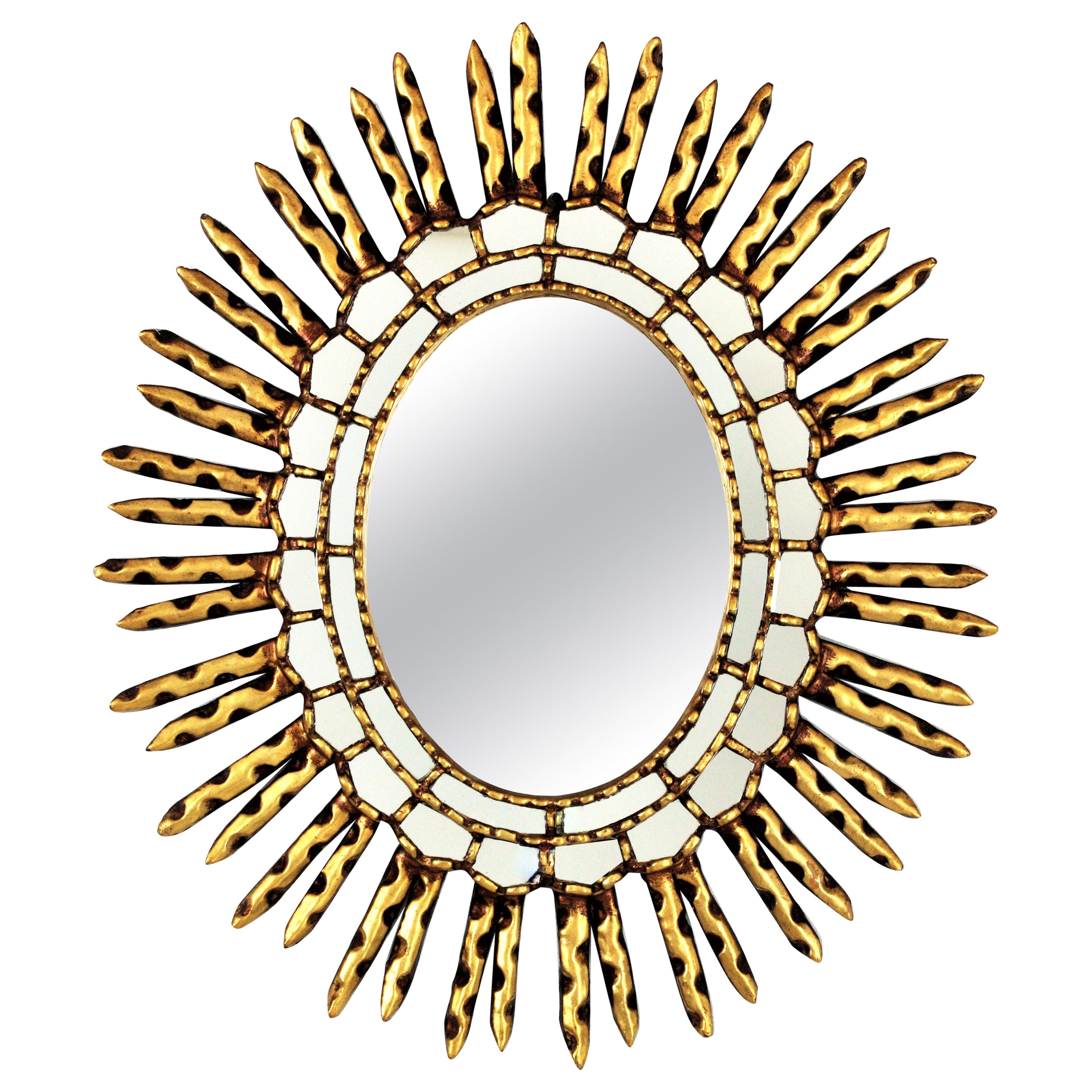 Miroir ovale colonial espagnol Sunburst en bois doré