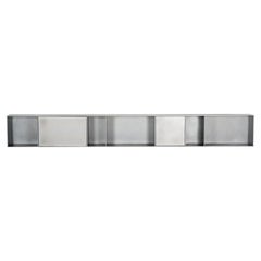 G Wall-Mounted Shelf with Doors in Waxed Aluminum Plate by Jonathan Nesci