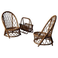 Set of Two Rattan Low Chairs and a Magazine Rack, Audoux Minet, 1960s, France