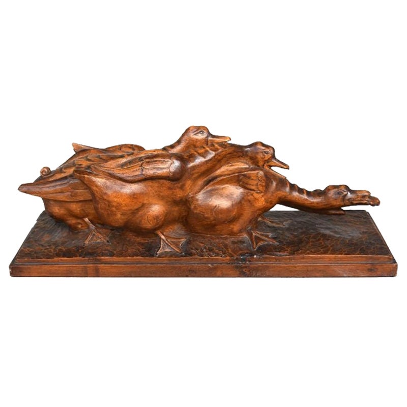 Wood Sculpture of Geese Fighting Over a Frog by H Petrilly Art Deco For Sale