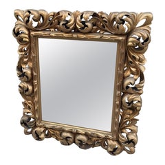 Miroir de style rococo en bois doré du XIXe siècle
