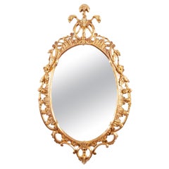 A George III oval Chippendale mirror