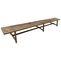 Elongated Low Wooden Bench with Iron Feet