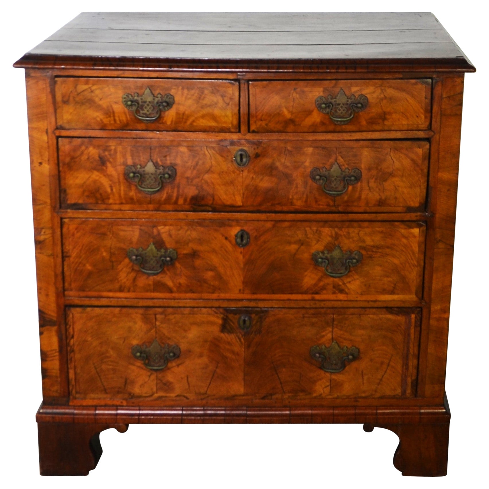 A George II Walnut Chest of Drawers / Commode For Sale