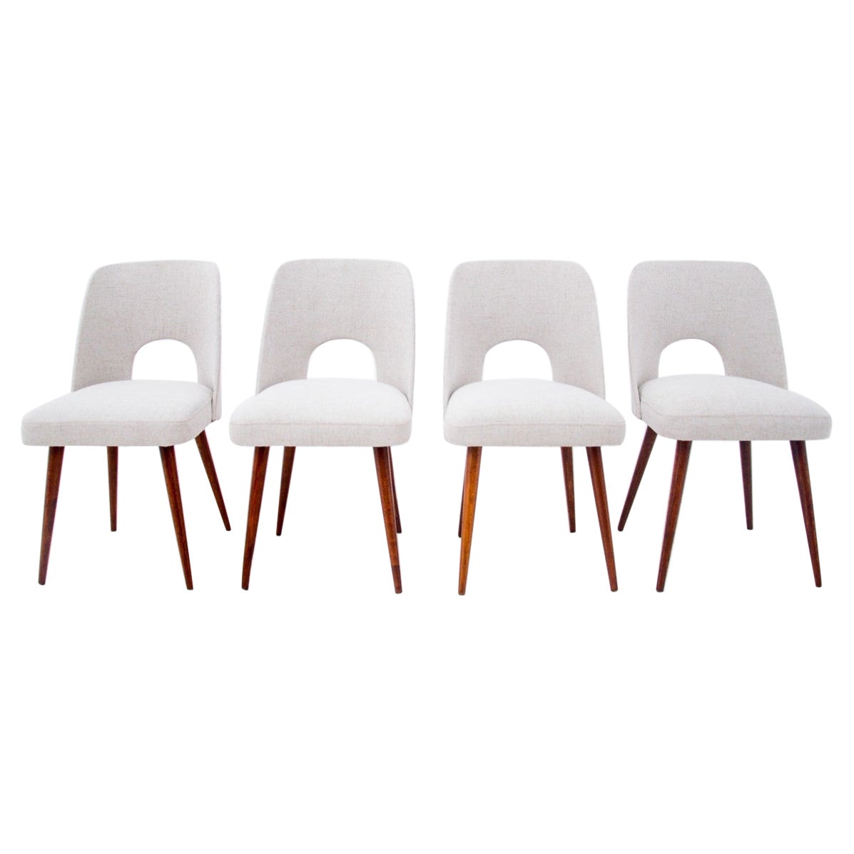 Set of four beige midcentury vintage chairs, Poland, 1960s.
