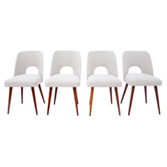 Set of four beige midcentury vintage chairs, Poland, 1960s.
