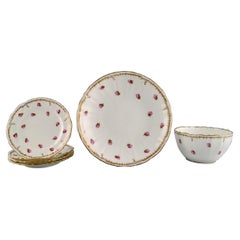 Plat, bol et quatre assiettes en porcelaine peinte à la main de Mintons, Angleterre