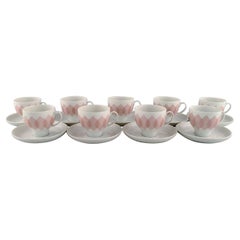 Bjørn Wiinblad, Rosenthal, Lotus Porcelain Service, 9 Coffee Cups with Saucers