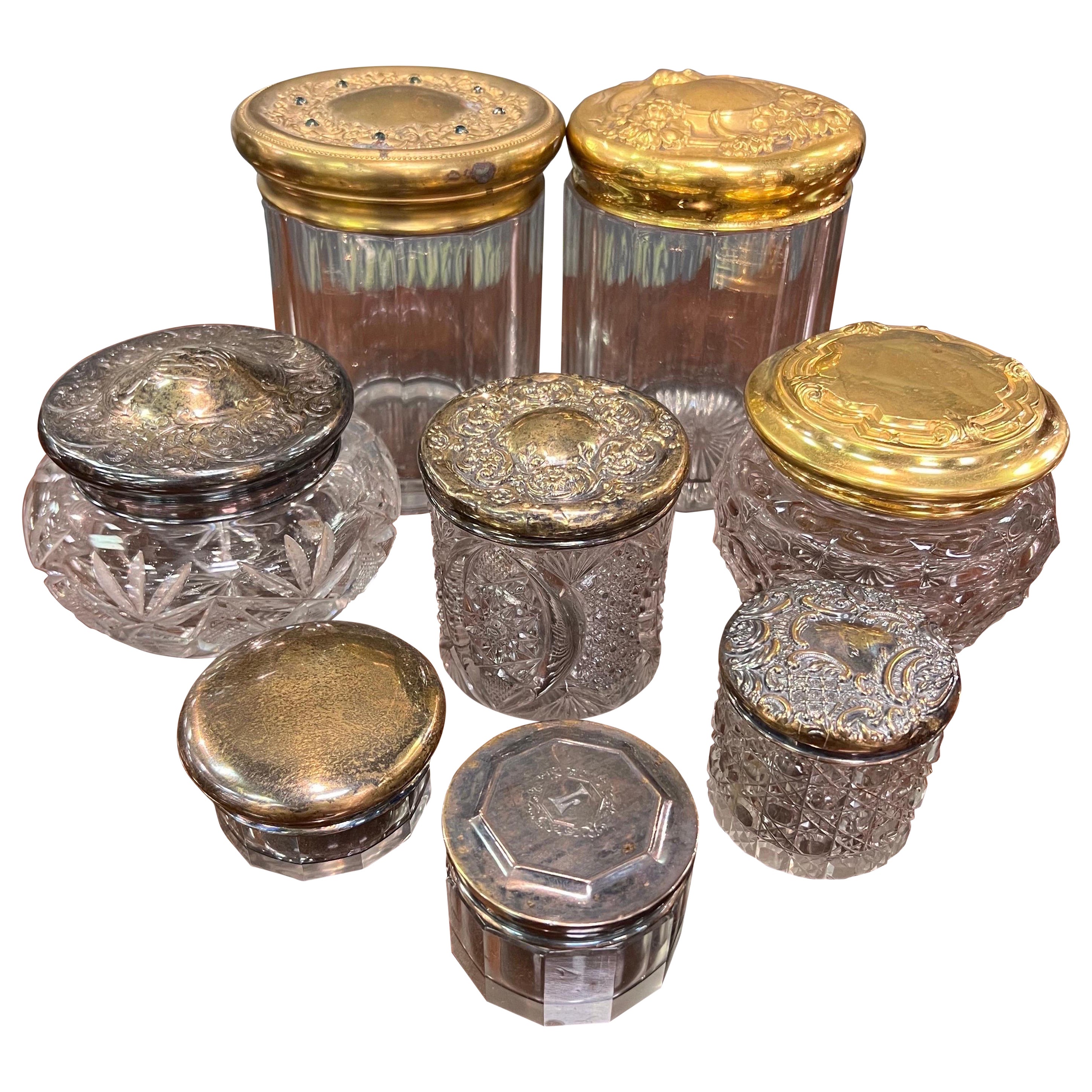 Grouping of 8 Cut Glass Jars with Sterling and Brass Lids For Sale