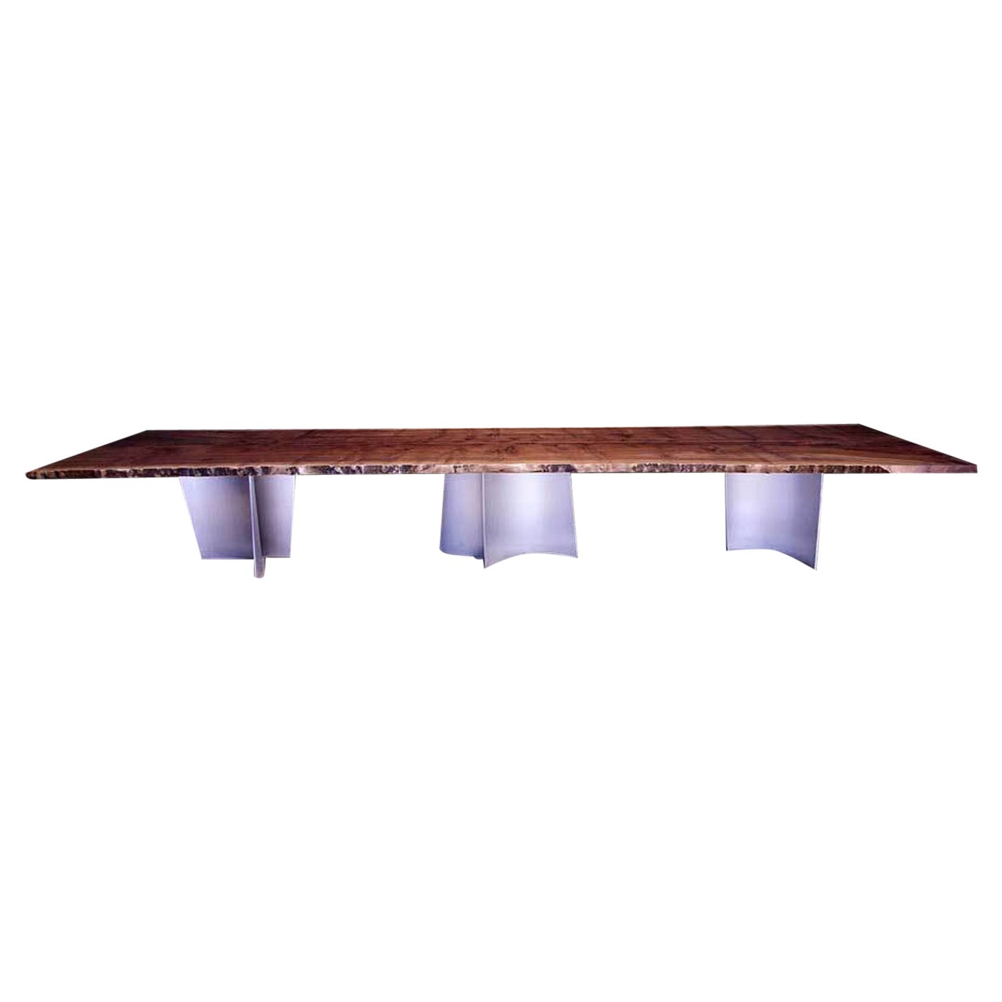 Moderner Esstisch mit 2 Platten aus schwarzem Nussbaumholz und geschwungenen Stahlbeinen