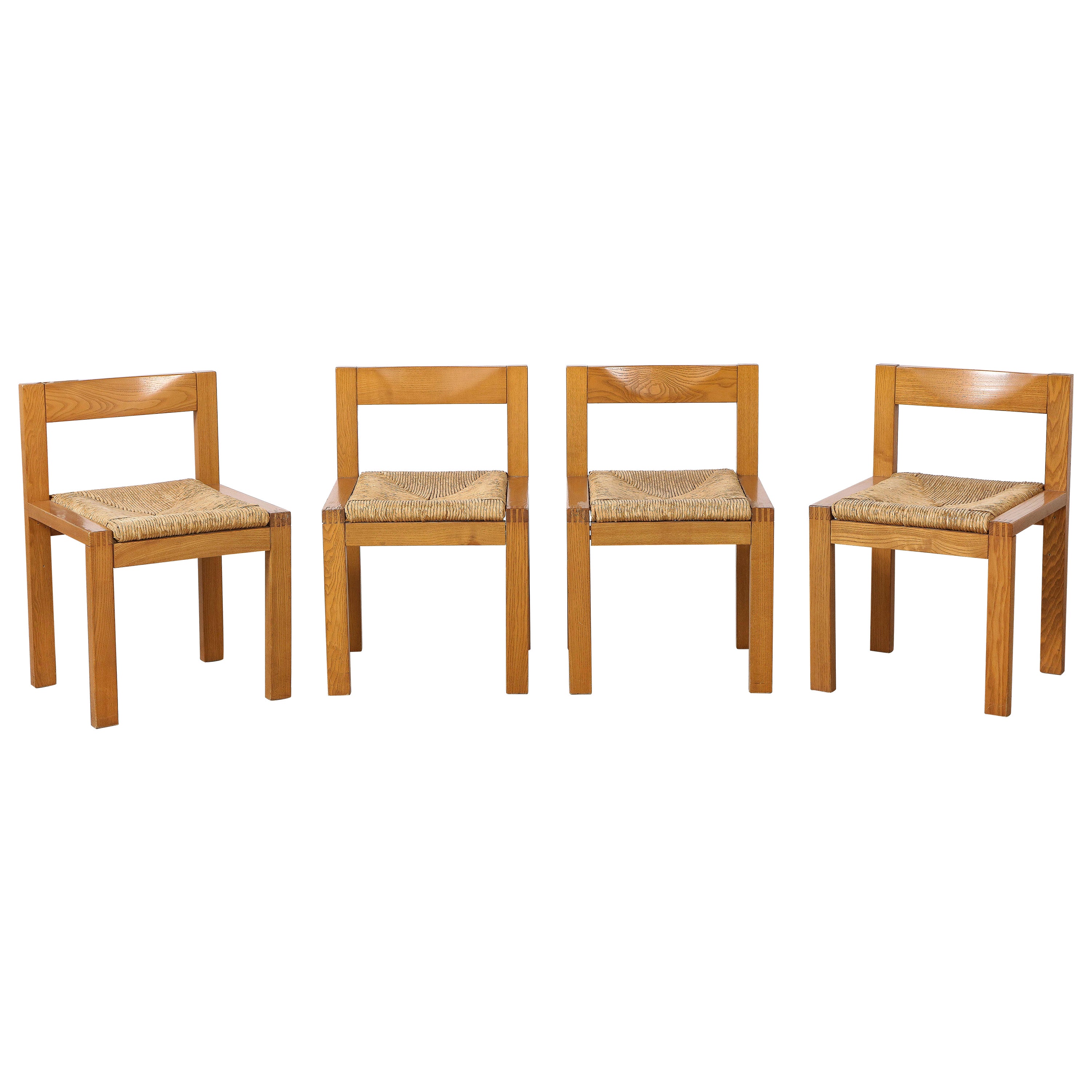 Set of Four Italian 1950's Oak and Rush Seat Dining Chairs