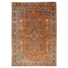 Ancien tapis persan Josheghan orange en laine surdimensionné fait à la main avec motif de médaillon