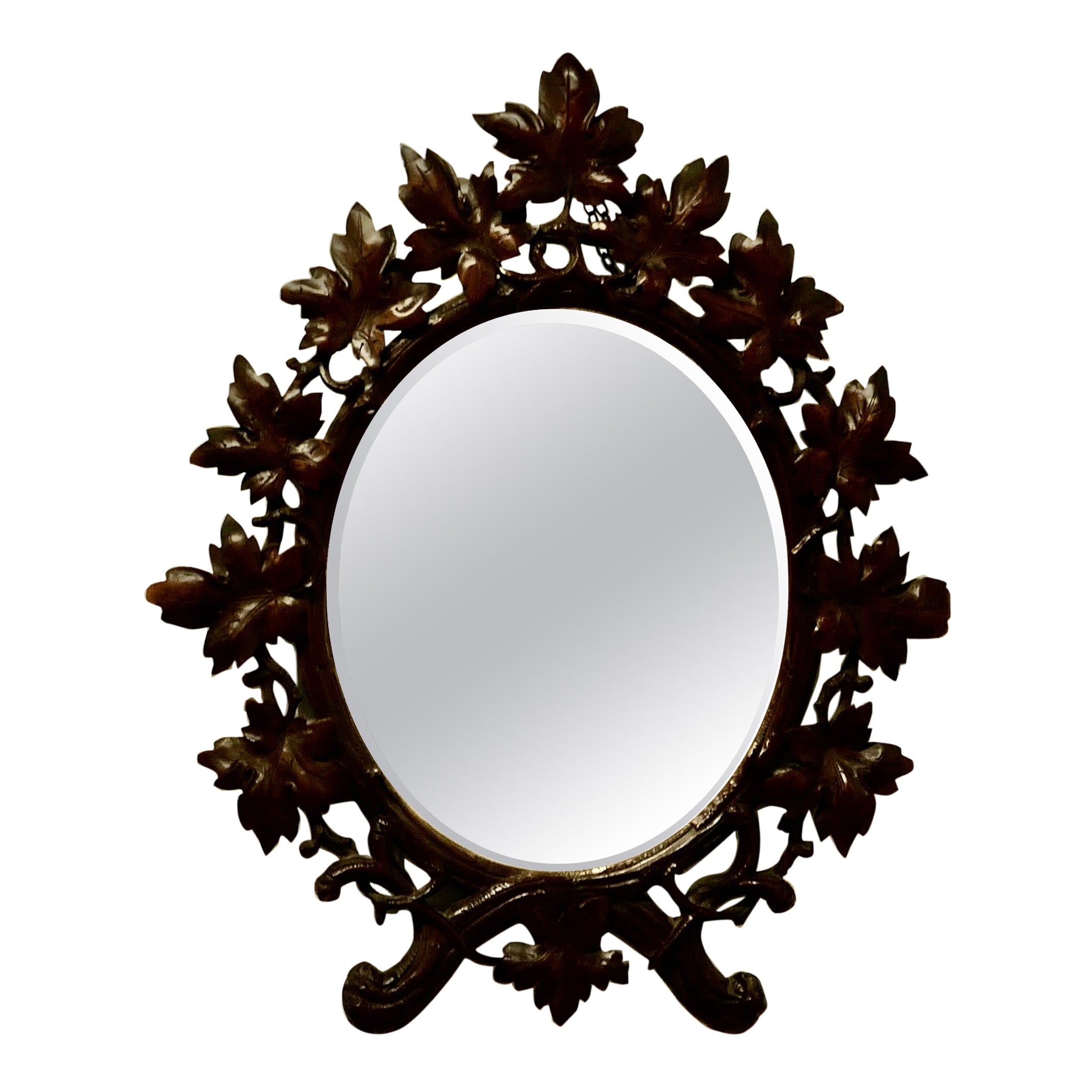 Black Forest Carved Oval Mirror For Sale