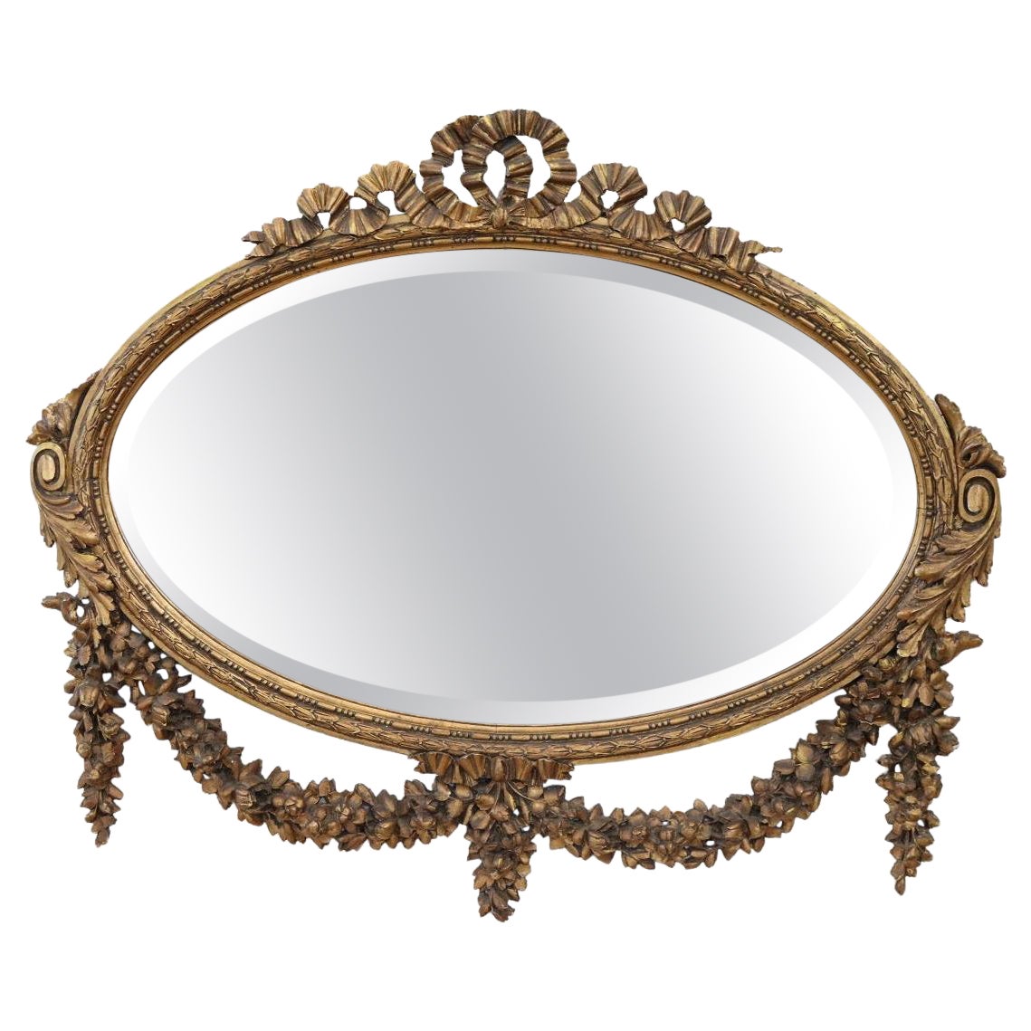 Early 20th Century Louis XVI Style Carved and Gilded Wood Oval Wall Mirror