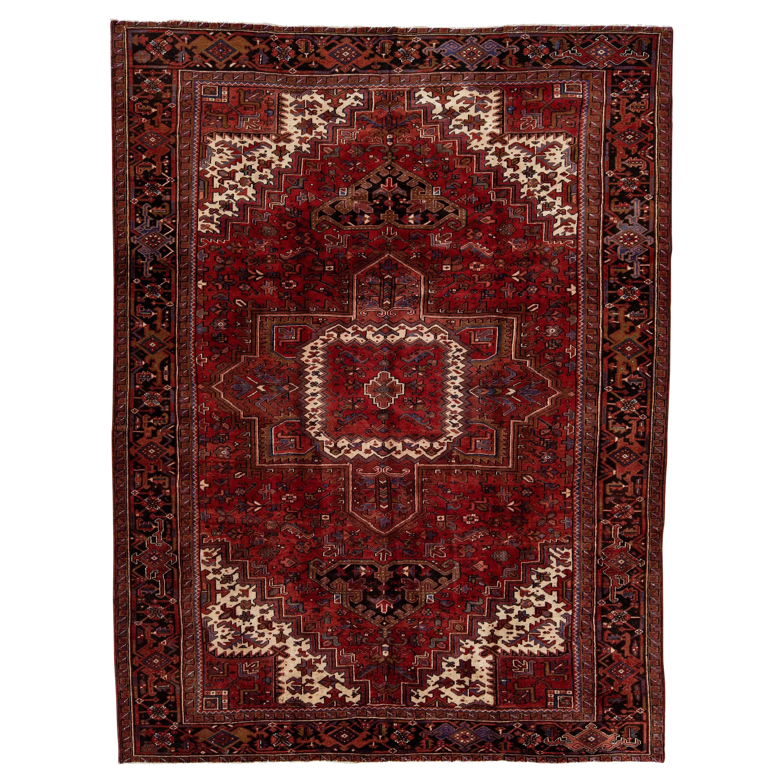Antique Heriz Red Handmade Persian Wool Rug with Medallion Motif