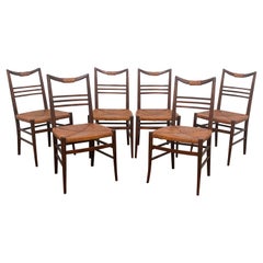Set of Six Modernist Italian Rattan Dining Chairs, Circa 1950s