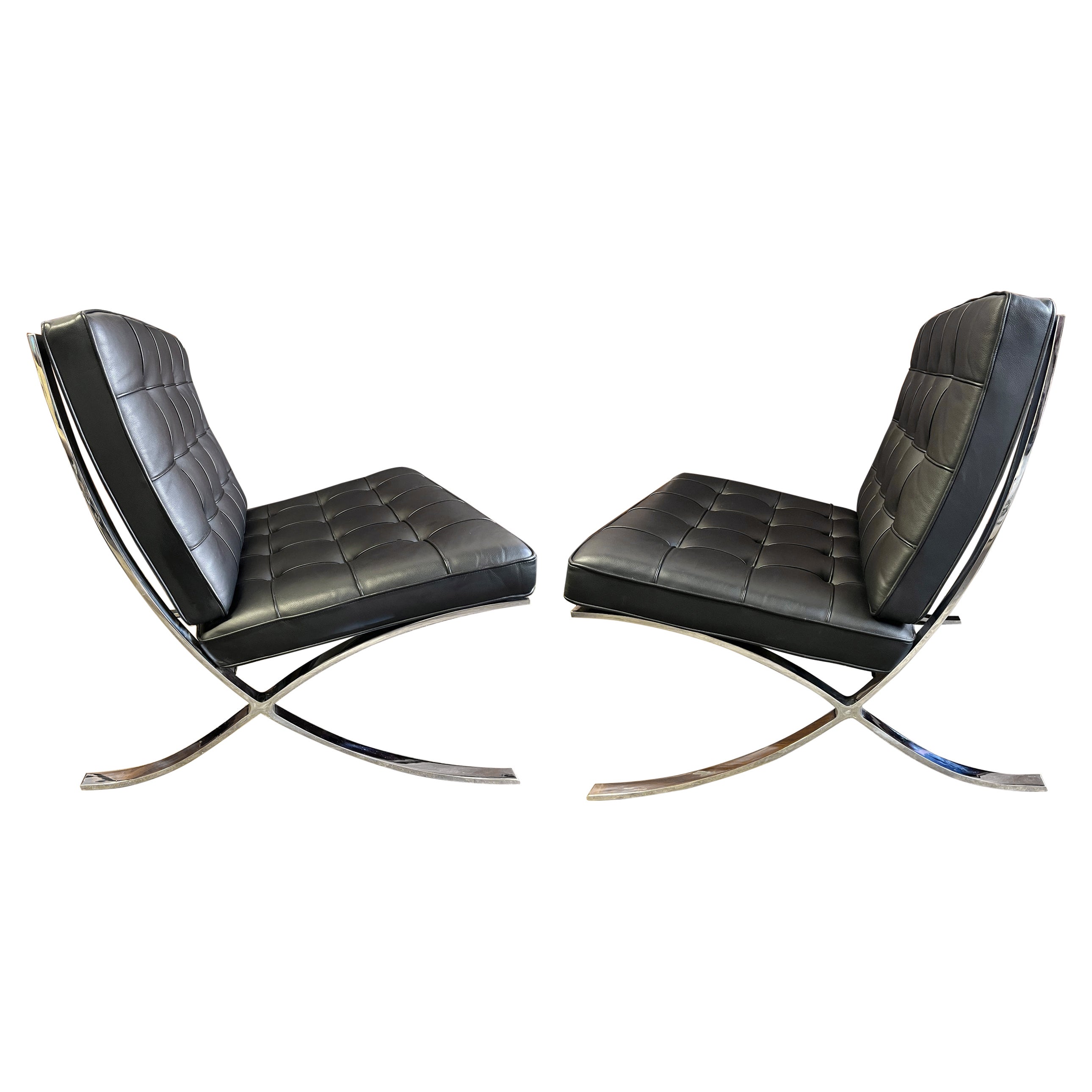 For your consideration are up to six Barcelona lounge chairs by Ludwig Mies van der Rohe for Knoll in black leather. The classic chair that helped define midcentury modernism. Featuring tufted cushions on a chrome frame. The frame is stamped
