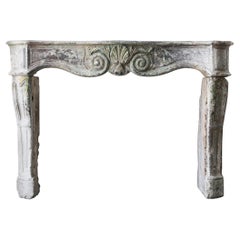 Louis XV Fireplace with a Beautiful Patina, 19th Century of French Limestone