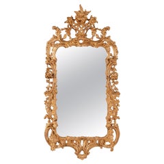 A Chippendale period carved wood and gilt mirror