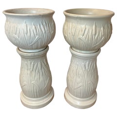 Pair of Robinson Rainsbottom Jardiniere and Pedestals with a Cattail Design