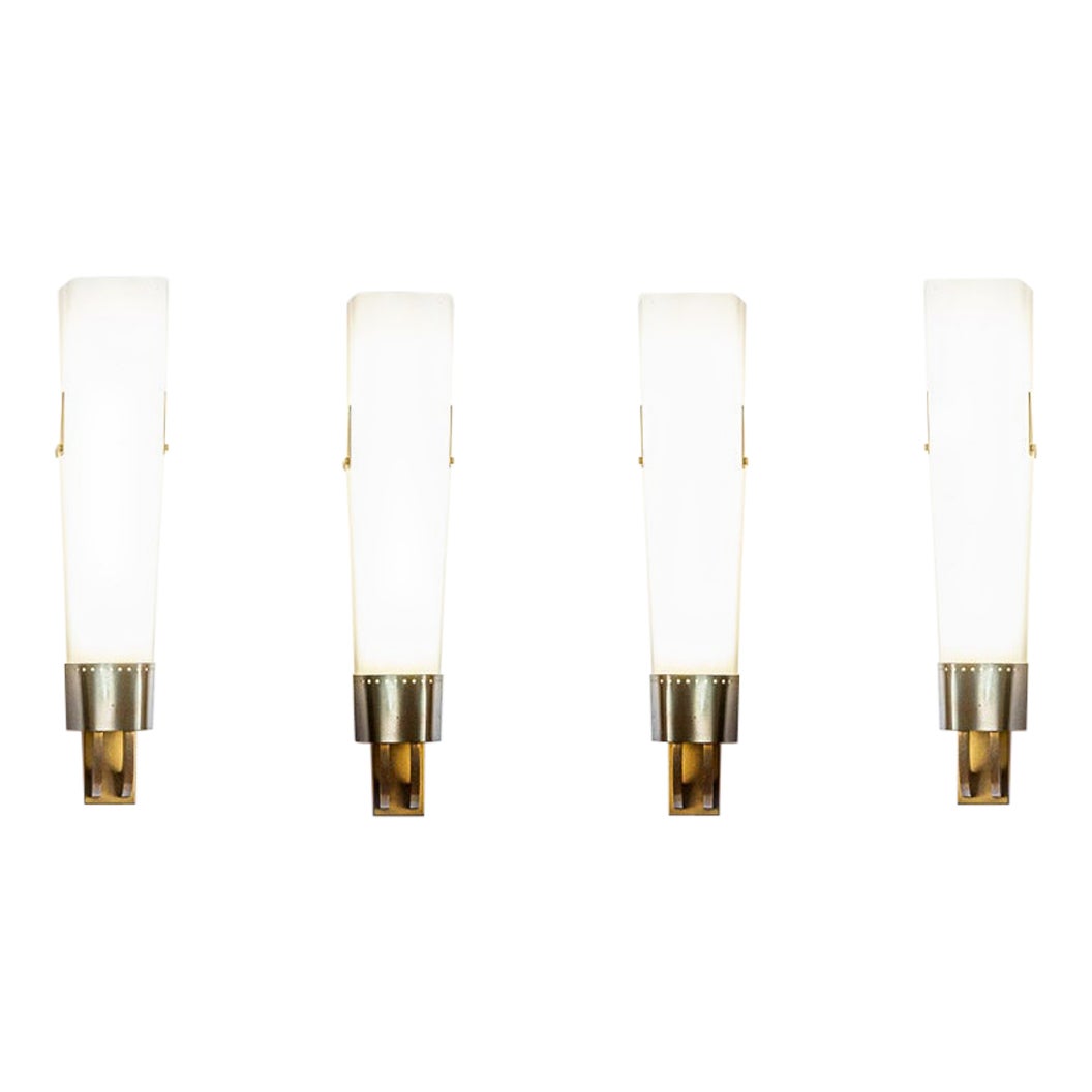 Extraordinary set of four large midcentury wall lights 