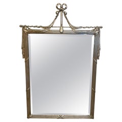 Grand miroir vintage en forme de guirlande et ruban en argent doré